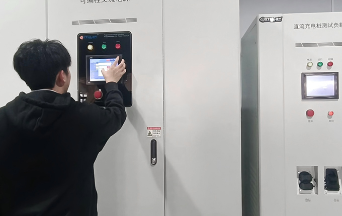 Workers inspect EV chargers